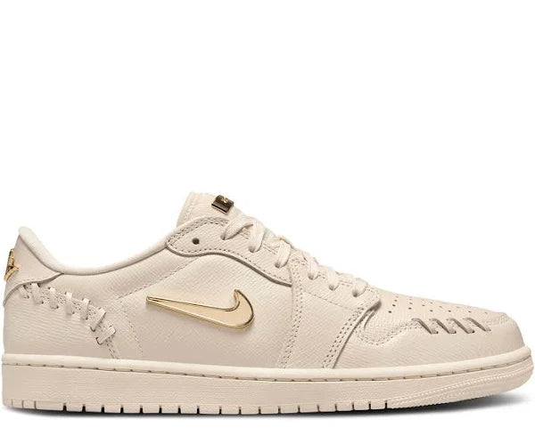 Jordan 1 Low - Method of Make 'Legend Light Brown' sneaker with premium beige leather, gold Nike Swoosh, and intricate stitching details.