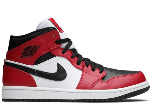 Jordan 1 Mid 'Chicago Toe' sneaker featuring a red, black, and white leather upper with a black Nike Swoosh and classic Air Jordan Wings logo.