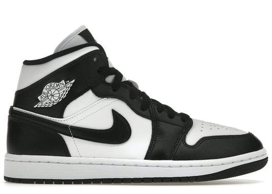 Jordan 1 Mid 'Panda' in black and white leather, featuring the iconic Air Jordan Wings logo and Nike Swoosh. Premium comfort and timeless style.
