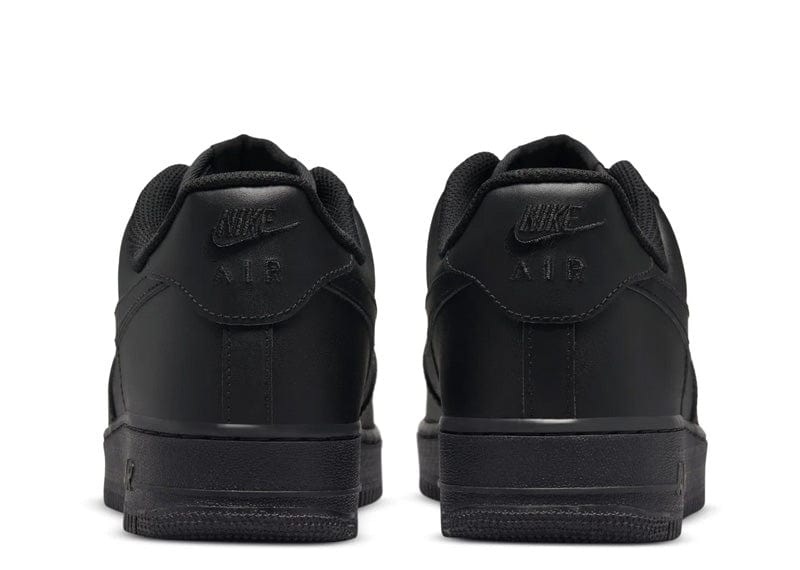 Rear view of Air Force 1 Low 'Black' sneakers highlighting the embossed Nike Air branding on the heel, delivering a stylish and iconic streetwear look.