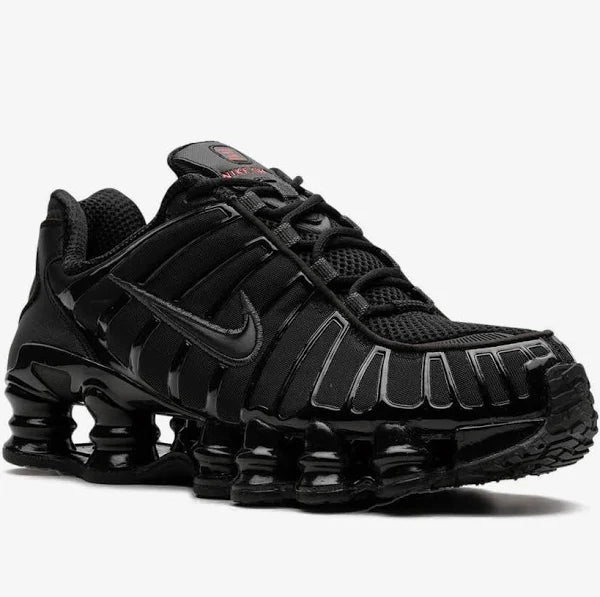 Nike Shox TL 'Black Max' side profile highlighting premium black materials, iconic Nike Swoosh, and Shox cushioning for ultimate support.