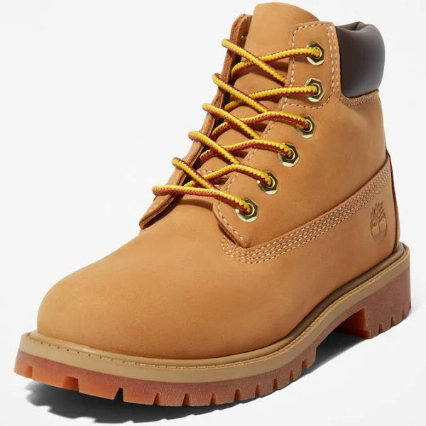 Front view of Timberland Premium 6-Inch Boot Unisex in wheat color, highlighting sturdy laces and waterproof nubuck leather.