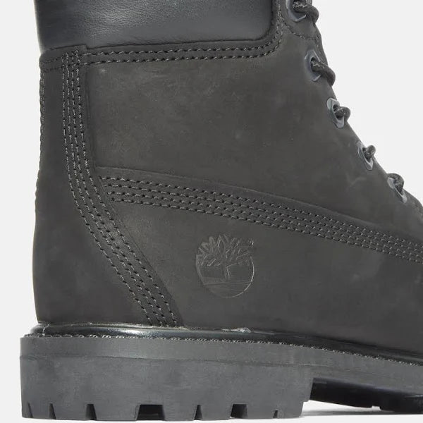 Close-up of Timberland Premium 6-Inch Boot Unisex in black, showcasing embossed logo, premium stitching, and waterproof nubuck leather.