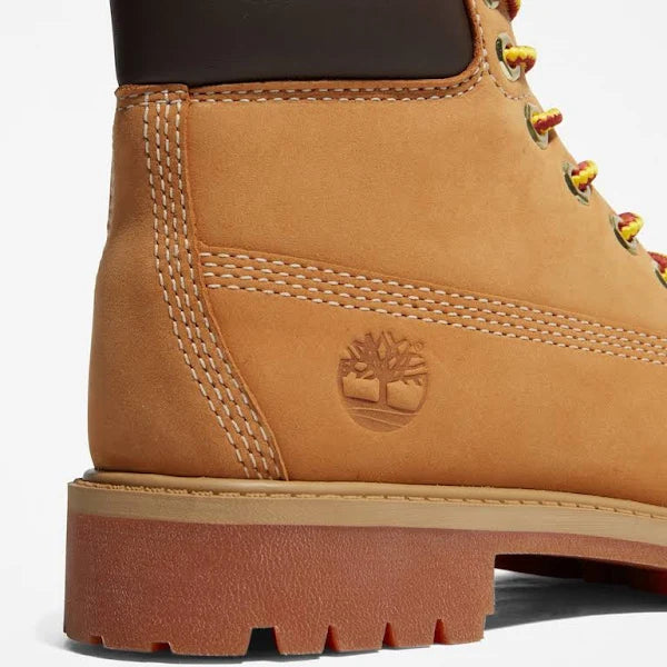 Close-up of Timberland Premium 6-Inch Boot Unisex showcasing embossed logo, premium stitching, and durable nubuck leather.