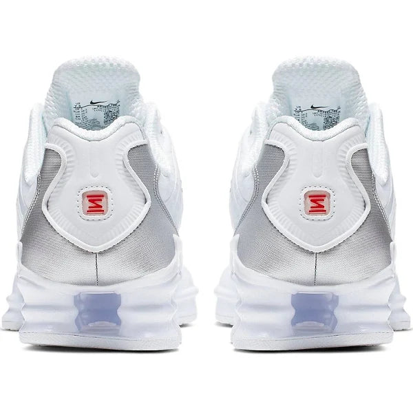 Back view of Nike Shox TL 'White Silver' sneakers with metallic silver heel panel and red Nike Shox branding. Stylish and performance-driven.