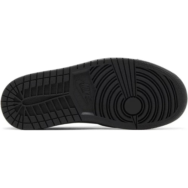 Outsole of Jordan 1 Low Method of Make Black sneaker displaying durable black rubber sole with classic traction pattern.