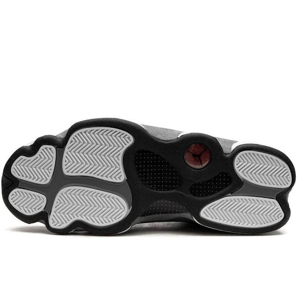 Outsole of Air Jordan 13 'Black Flint' featuring a durable rubber sole with herringbone traction pattern for superior grip and performance.