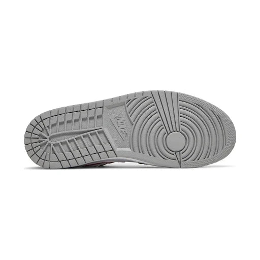 Close-up of the Jordan 1 Low Light Smoke 'Grey Red' outsole, highlighting the durable grey rubber traction pattern for superior grip and stability.
